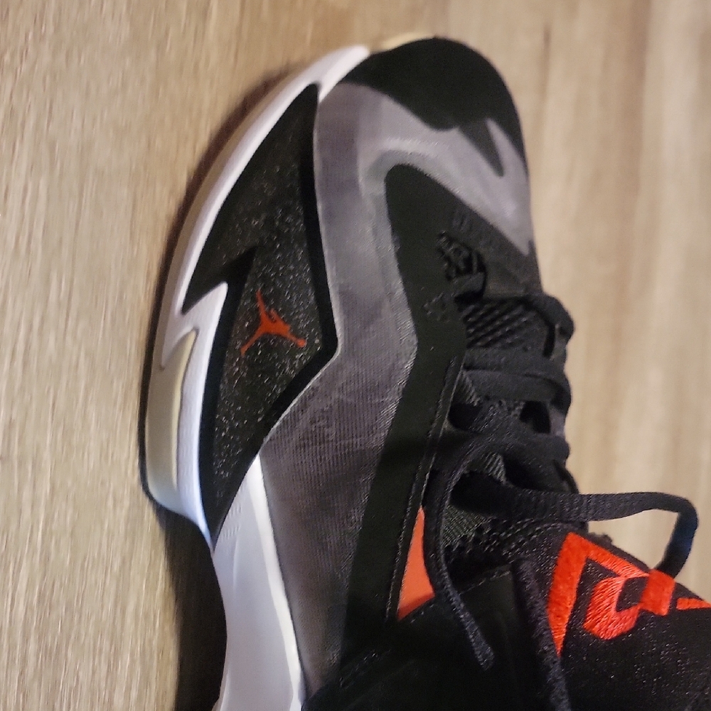 Black and Gray Athletic Sneakers with Red Accents
